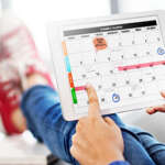 Person looking at personal calendar on tablet