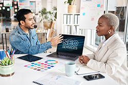 Toms River SEO professional in a meeting with a client