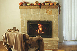fireplace decorated for fall after Monmouth County chimney service company visit